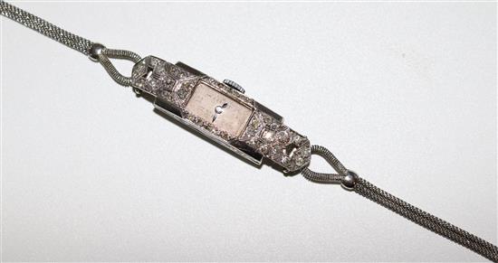 A ladys 1930s Art Deco platinum and diamond set manual wind cocktail watch(-)